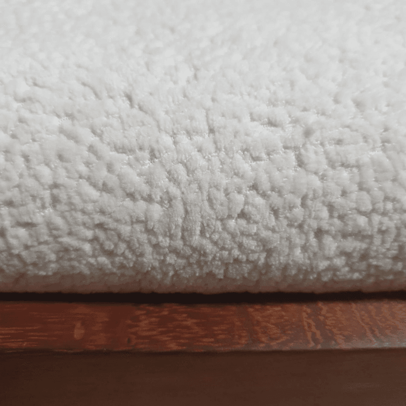 Premium pelt bouclé upholstery texture detail